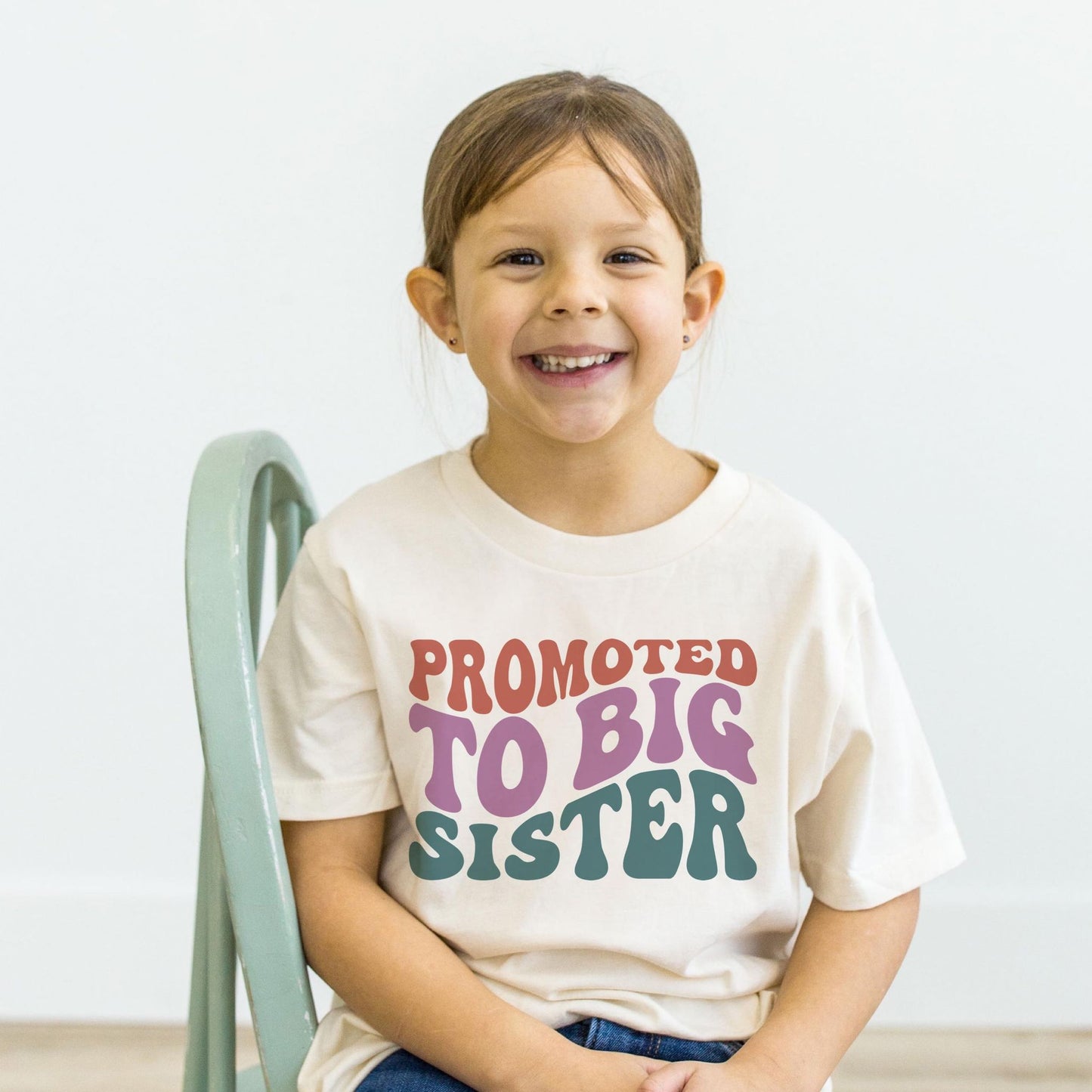 Kids T shirt with text promoted to big sister