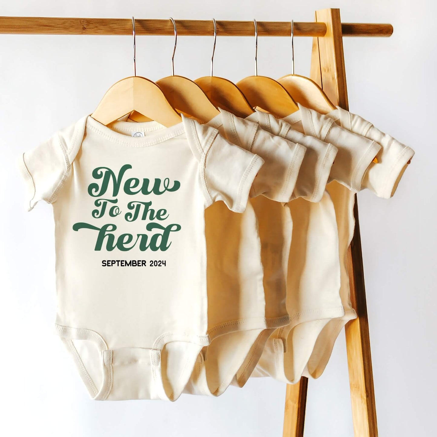 New to the Herd baby onepiece
