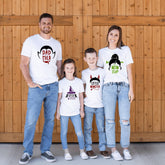 happy family wearing the Halloween Monster Family Shirts in white