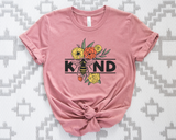 Pink t-shirt with a bee and floral design on a patterned background