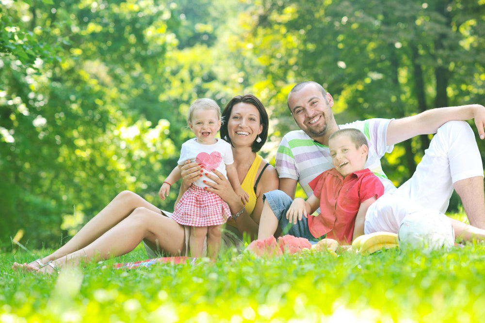 Australian family enjoying a sunny summer day outdoors with kids.
