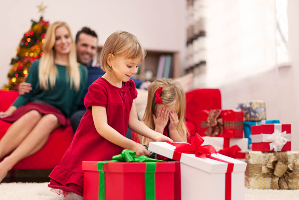 family opening their last-minute Christmas presents