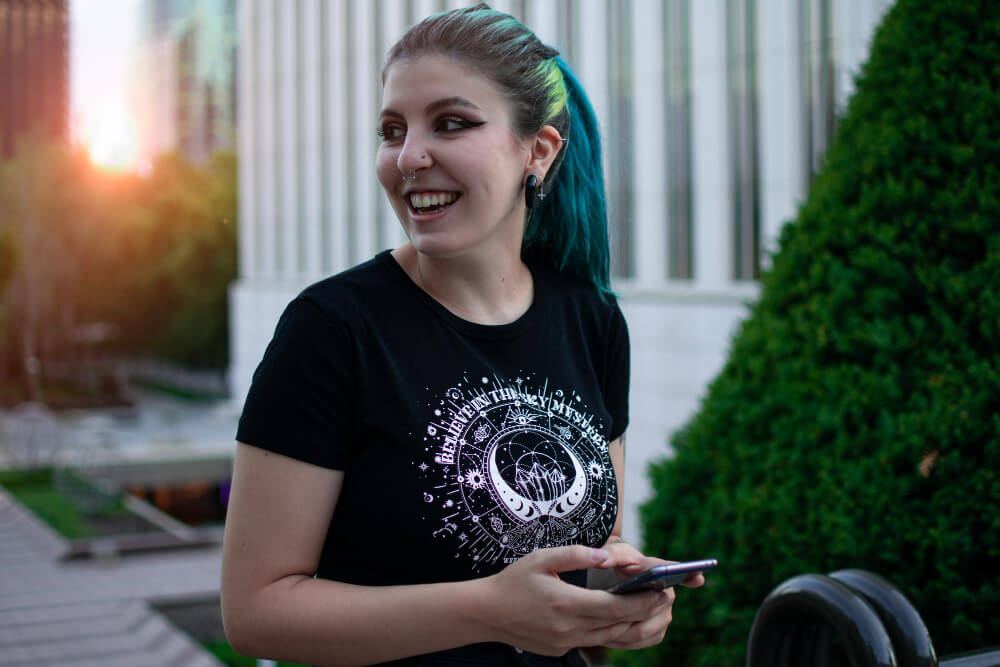 young lady wearing a graphic tee