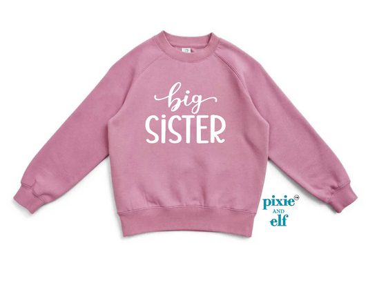 Big sister in pink jumper