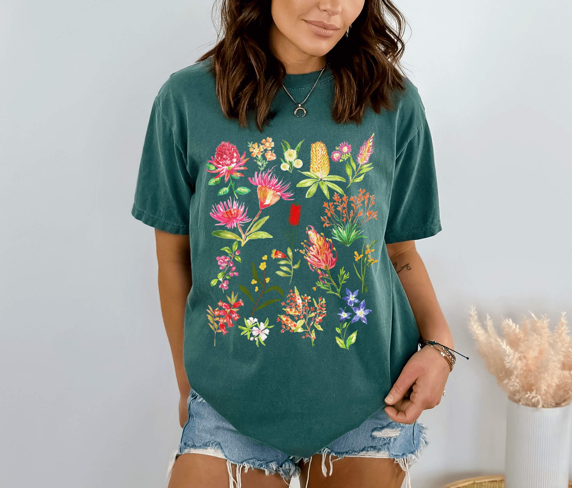 Green spruce Australian flowers shirt featuring colourful native flower artwork