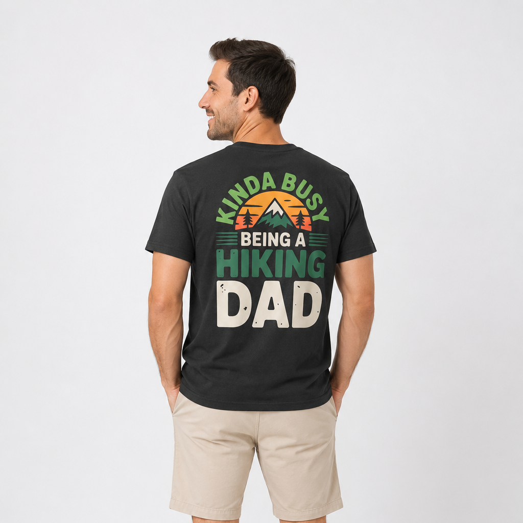 Man wearing a black t-shirt with 'Kinda Busy Being a Hiking Dad' text on a white background