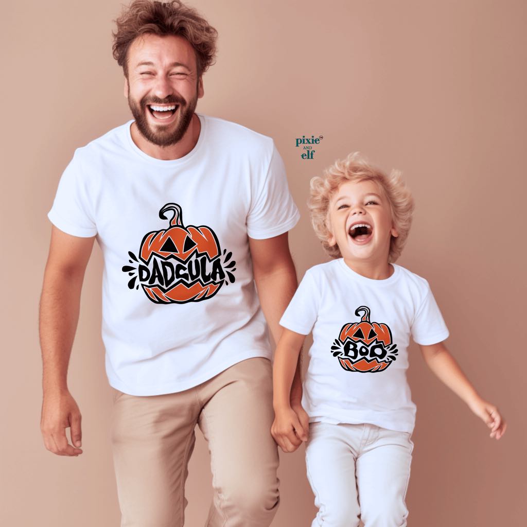 Dad and son wearing matching pumpkin shirts