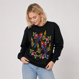 Woman wearing a black jumper with Australian Crimson Rosella birds and wattle flowers