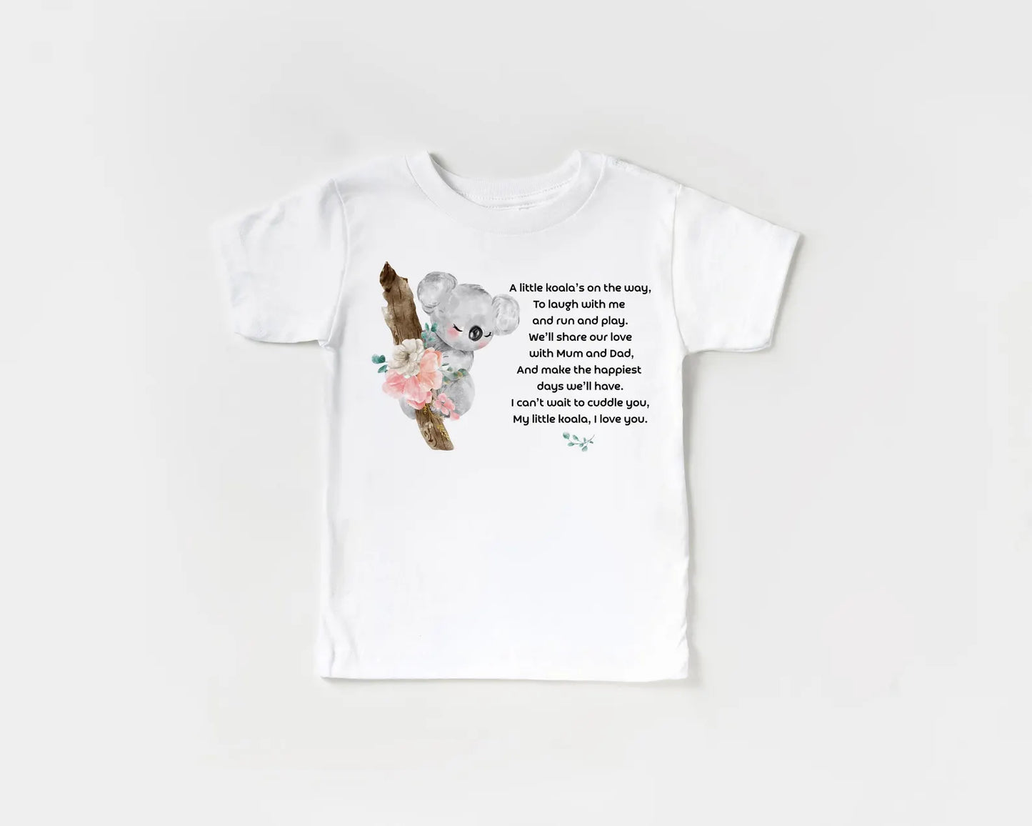 White t-shirt with a teddy bear graphic and text on a white background