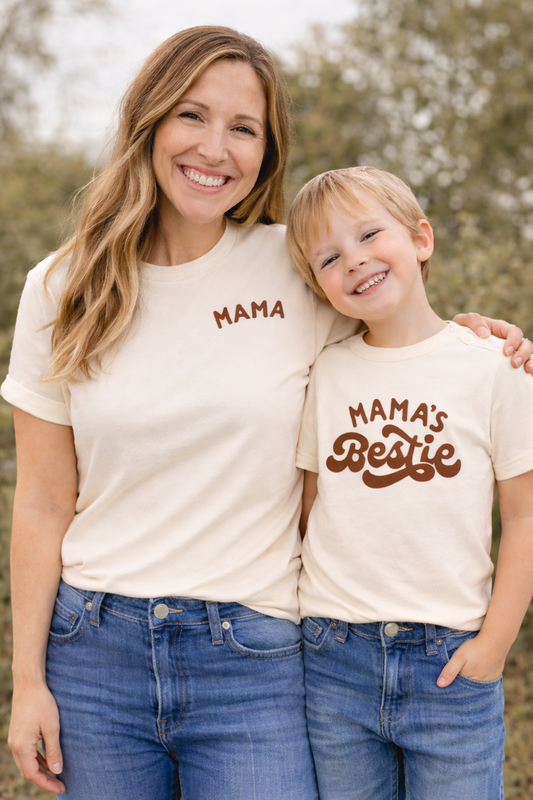 Woman and child wearing matching t-shirts with 'MAMA' and 'MAMA's Bestie' text.