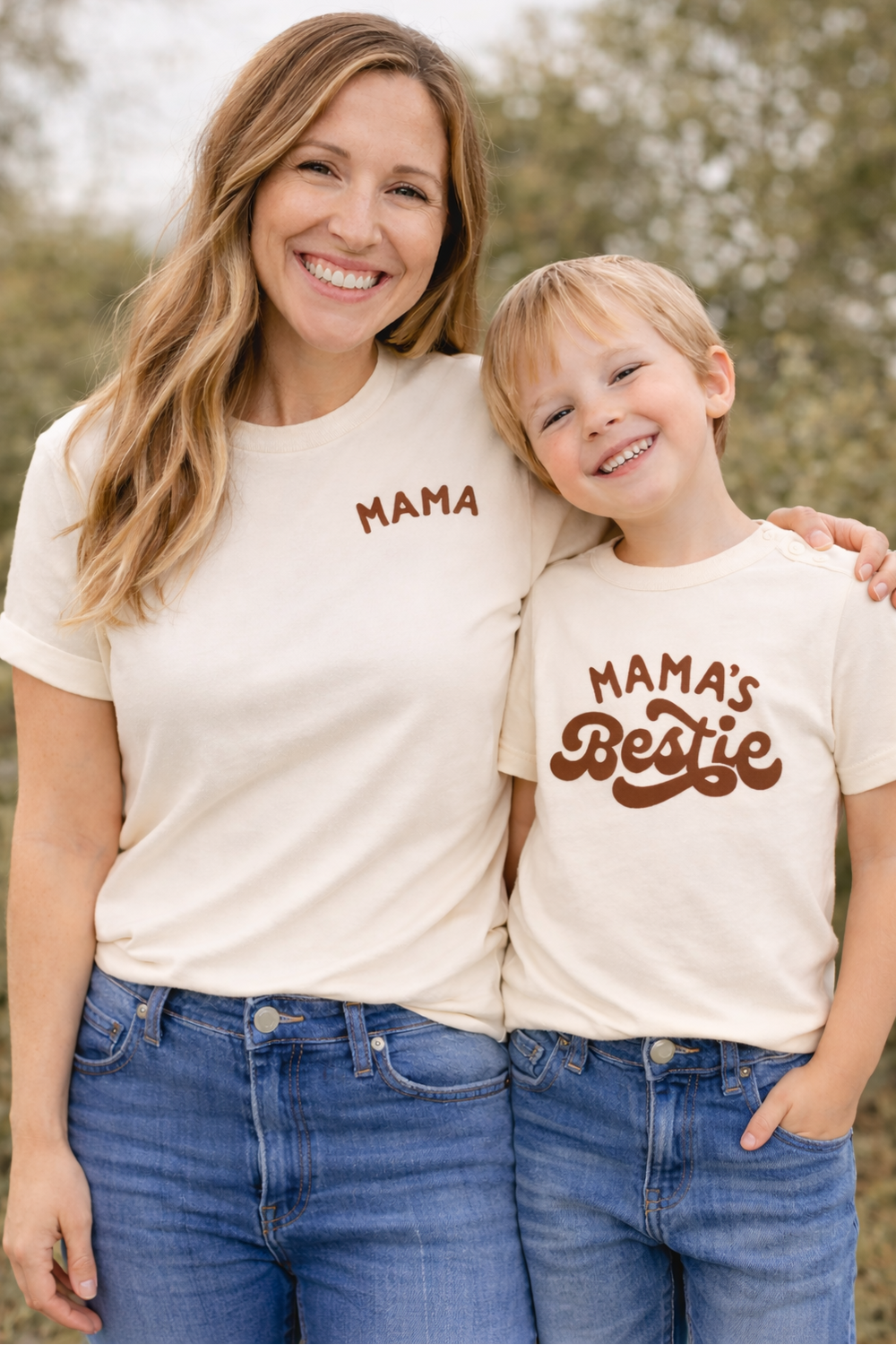 Woman and child wearing matching t-shirts with 'MAMA' and 'MAMA's Bestie' text.