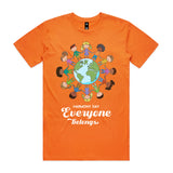 Orange t-shirt with a graphic of children around the world and 'Harmony Day Everyone Belongs' text on a white background.