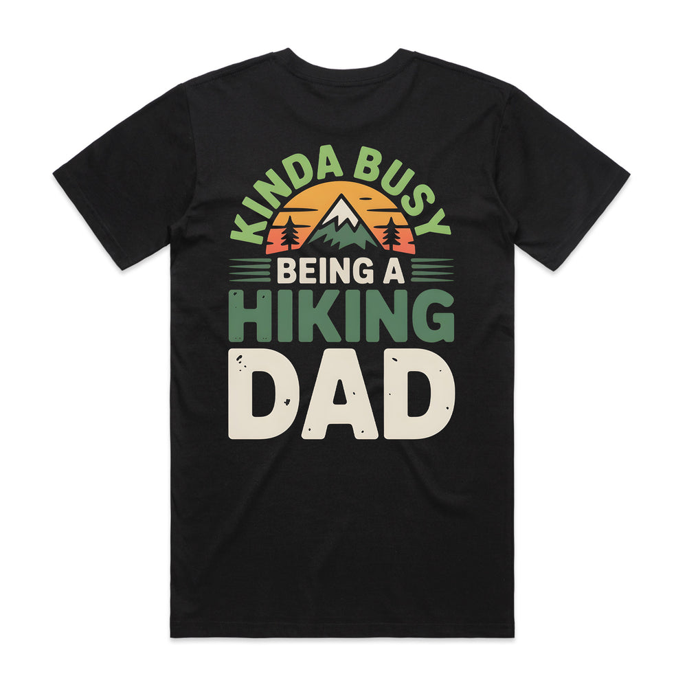 Black t-shirt with 'Kinda Busy Being a Hiking Dad' text and mountain graphic on a white background